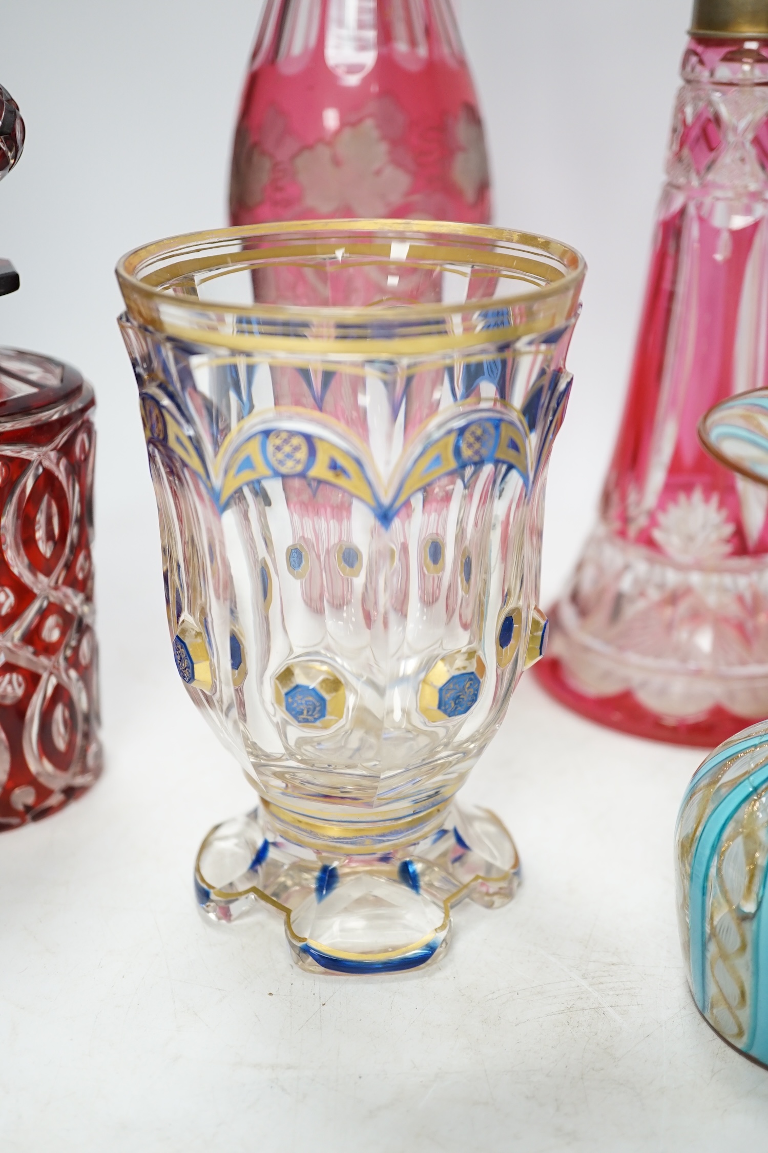 Six pieces of Victorian and later glassware including Italian Vedar cocktail goblet, Bohemian cranberry glass atomiser and art glass vase, tallest 34cm. Condition - poor, fair and good, smallest piece broken and restored